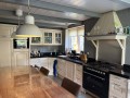 Foto van Gangbaar melkgeitenbedrijf met stolpboerderij